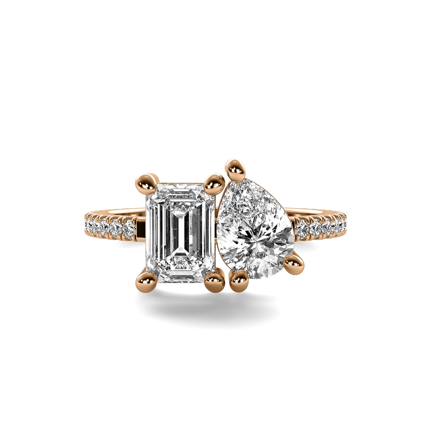 Emerald Cut and Pear Shape Diamond Ring